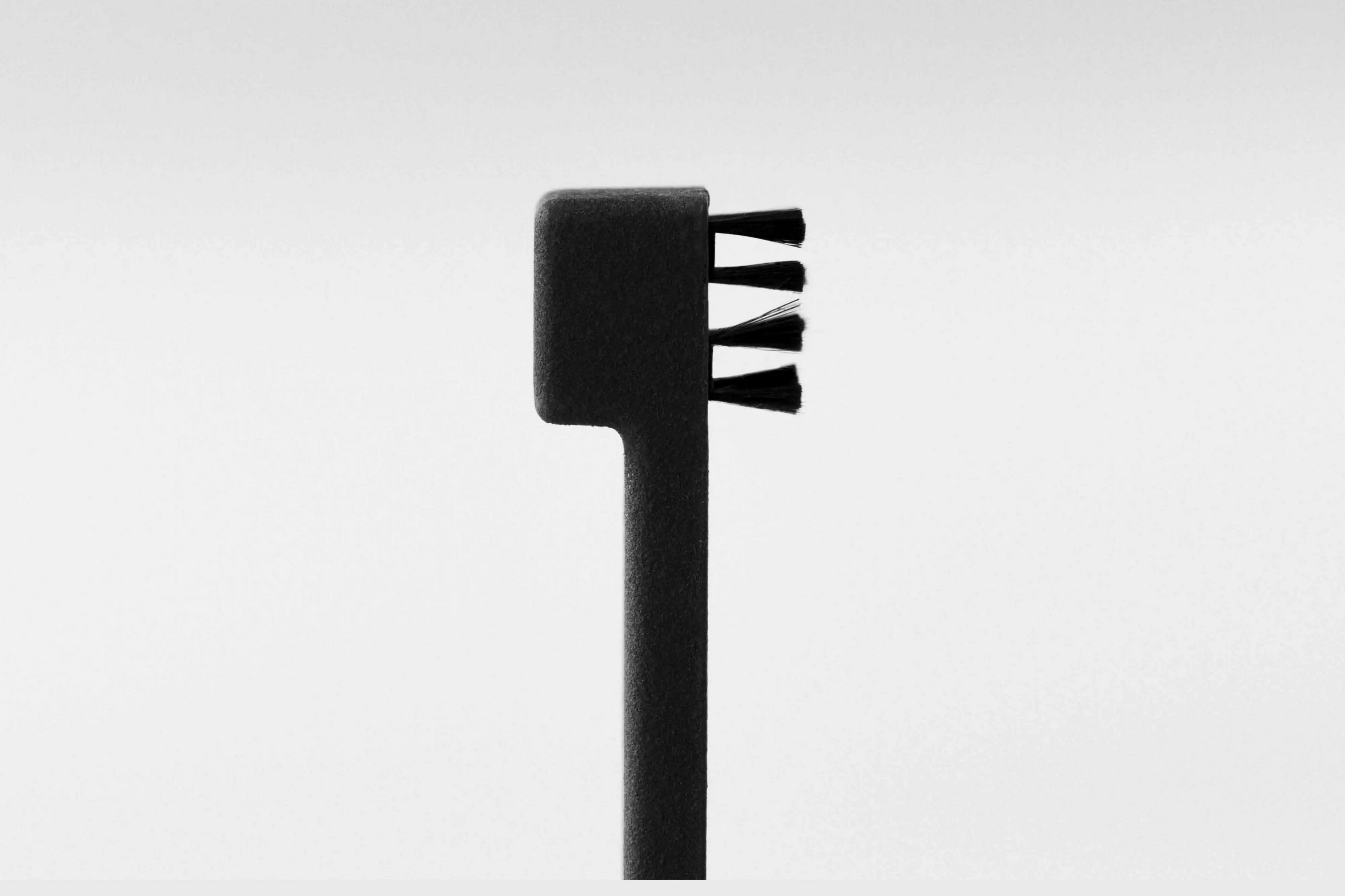 Anti-static stylus brush
